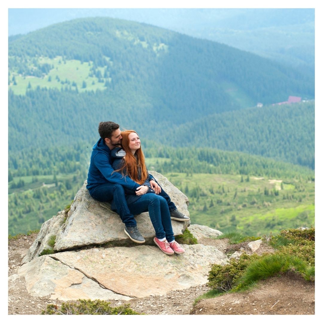 couple enjoying time together in the mountains